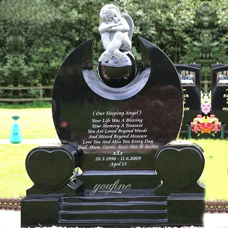 Granite headstone with crescent moon and star motif